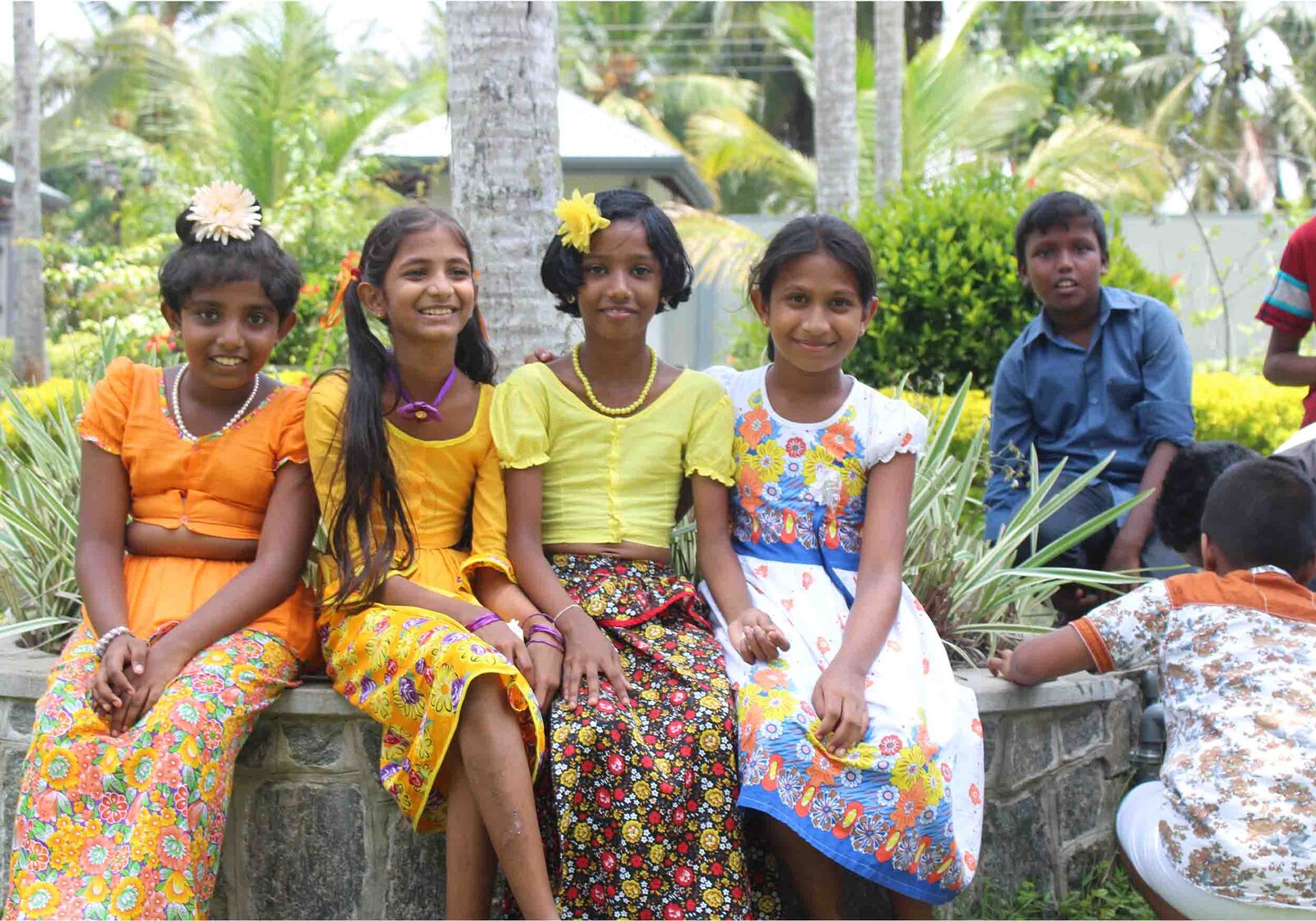 Children gathered outdoors at the community centre